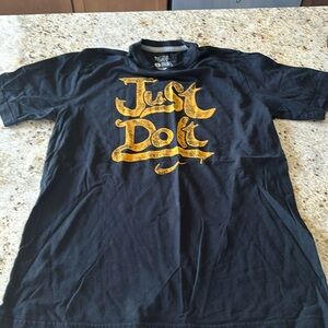 Never worn Nike “just do it” black cotton t shirt size L.